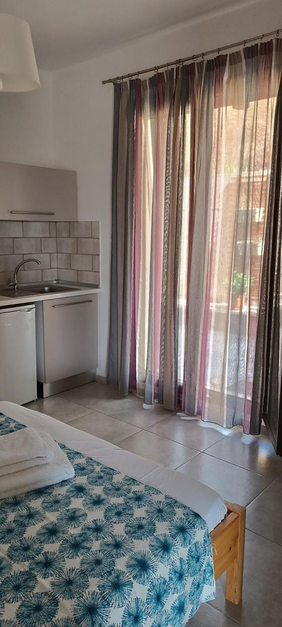 Avli Apartments Pyrgadikia Pokoj fotografie